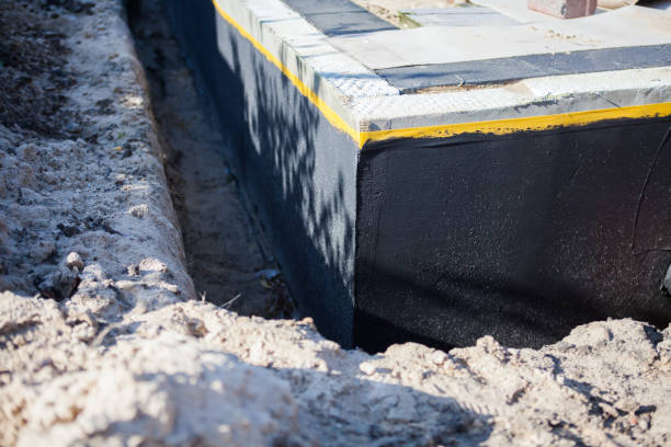 Professional Basement Waterproofing technician working in Palmyra, NJ